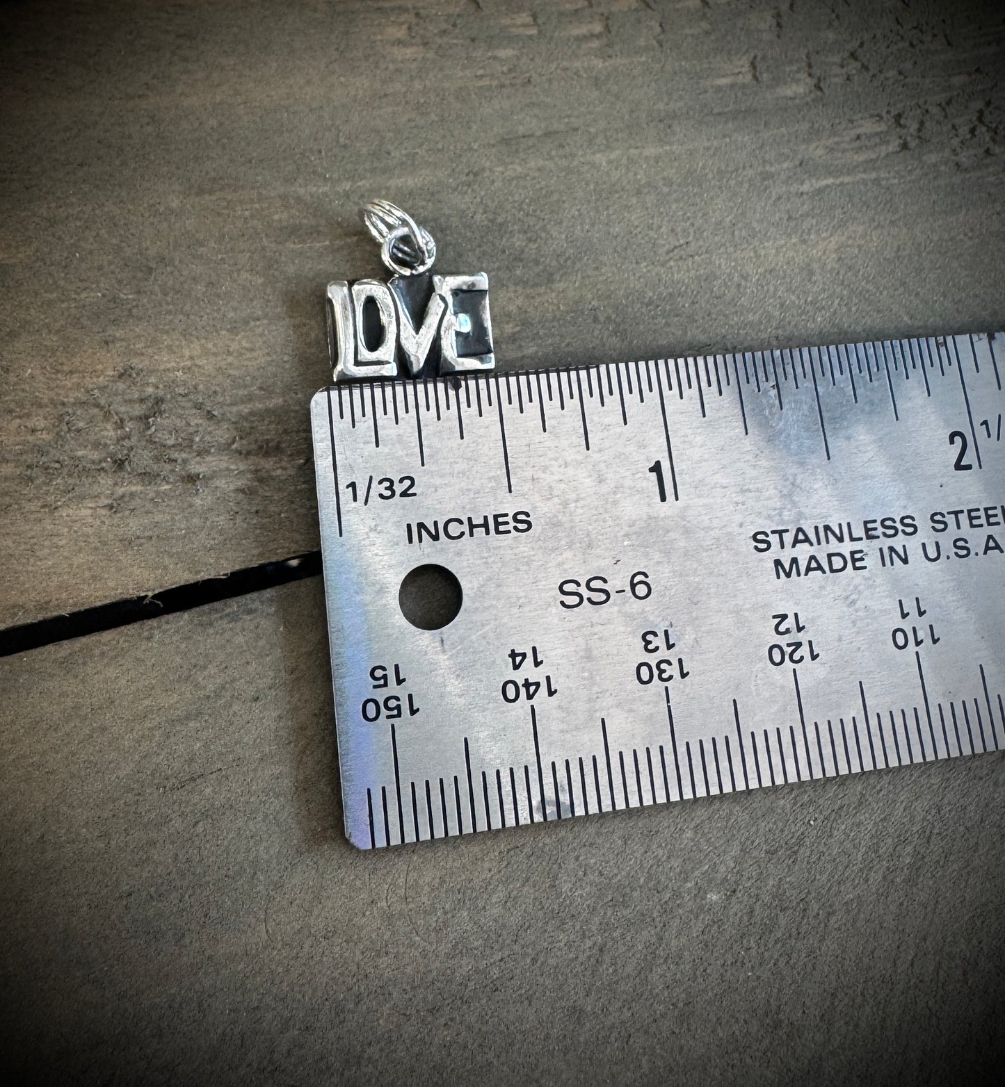 "Love" pendant